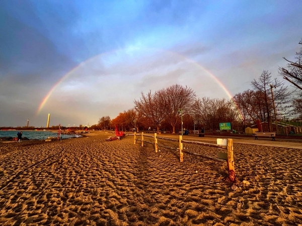 FULL RAINBOW OVER THE BEACH